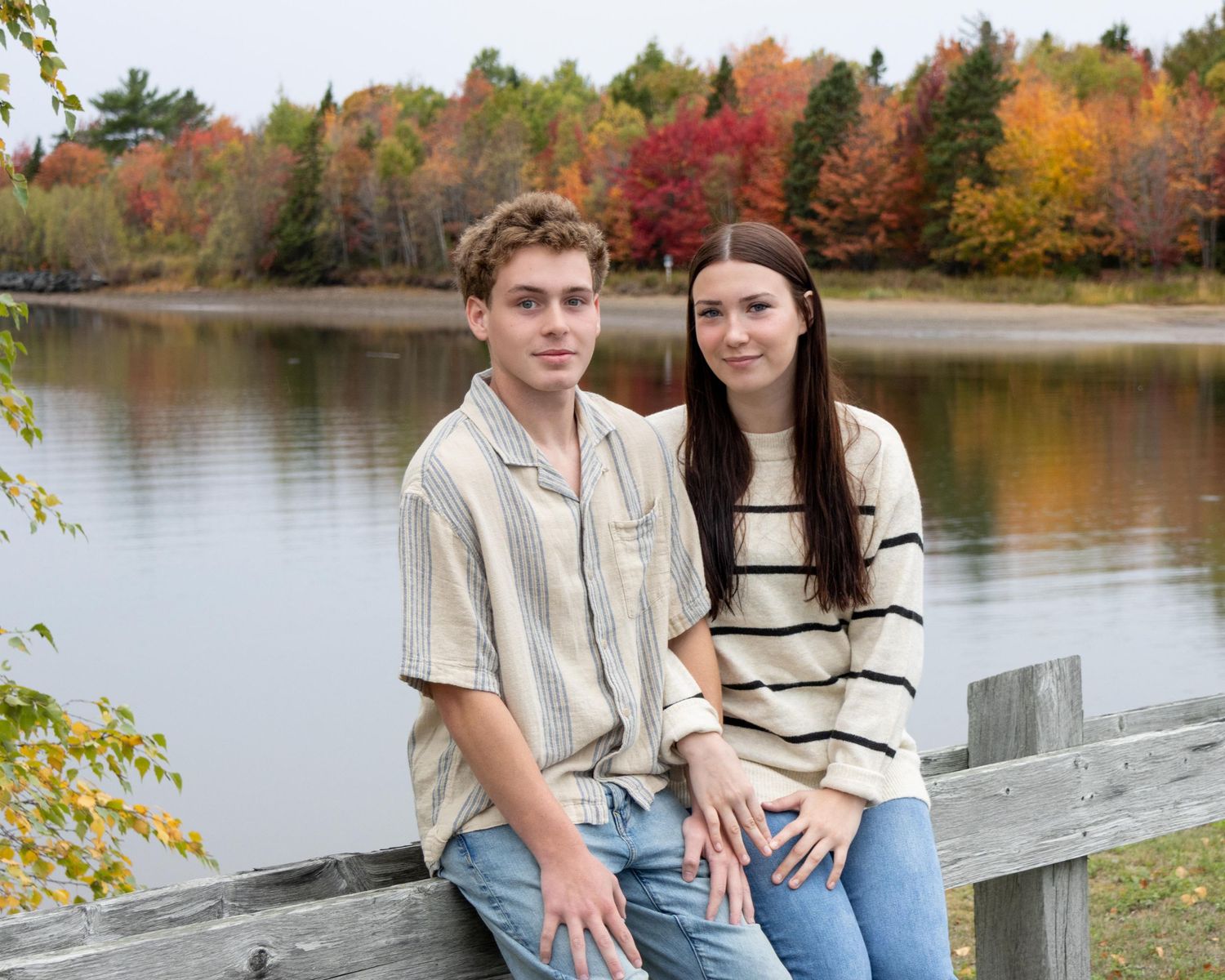 Family studio portrait with soft lighting and neutral backdrop in Miramichi
