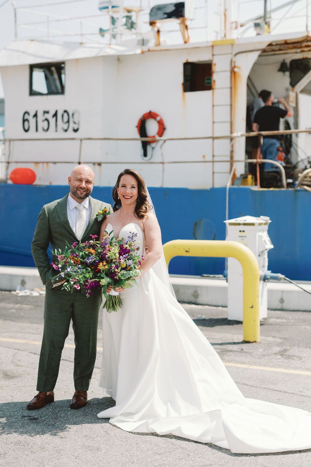 A bride and groom share joyful moments in a series of wedding photos against a white and blue nautical backdrop.