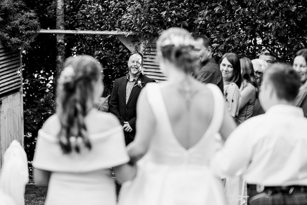 groom sees bride, photographers Motueka, emotional wedding photos, documentary style wedding,