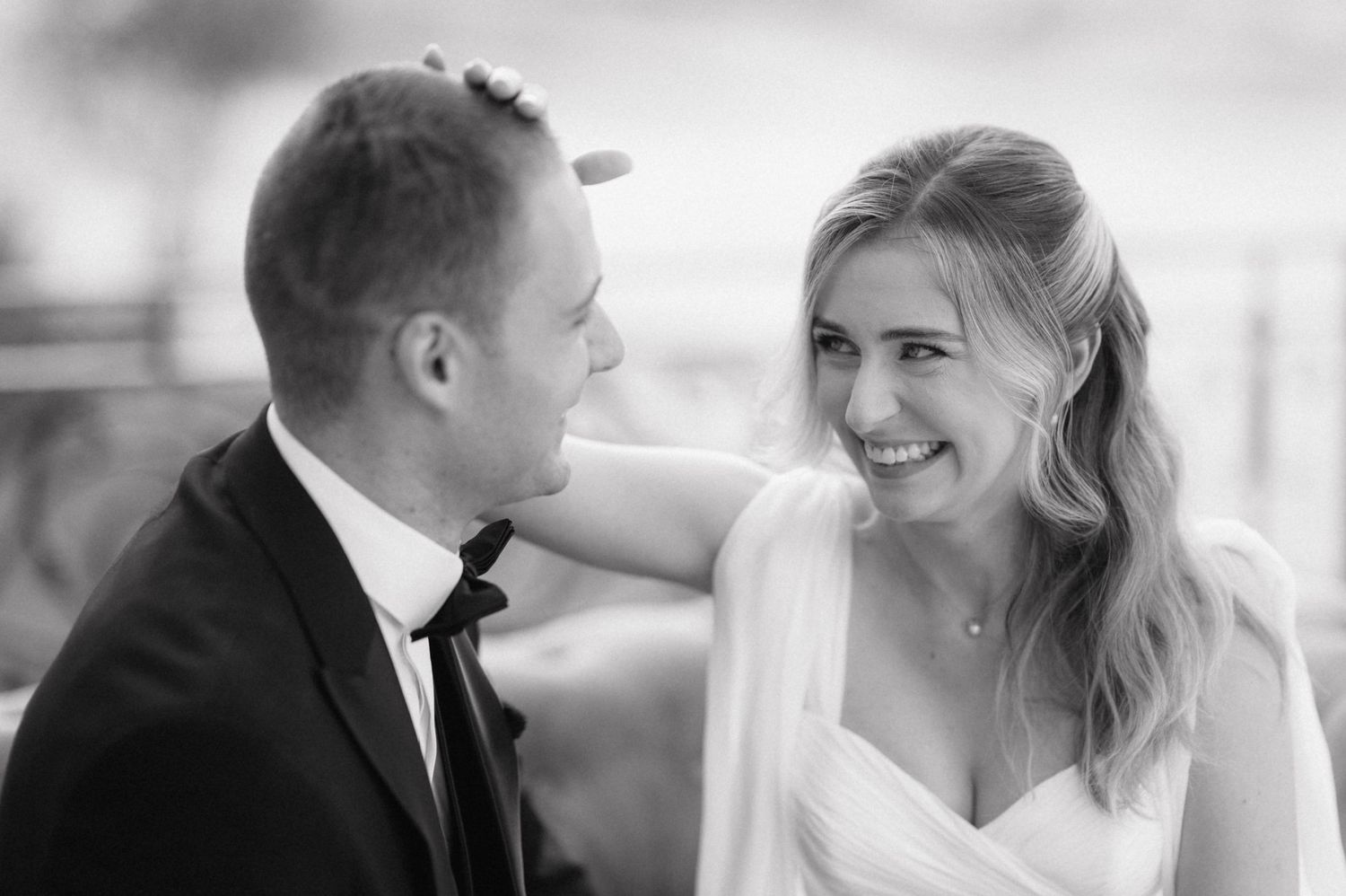 Romantic black and white wedding photo collage showing intimate moments between bride and groom.