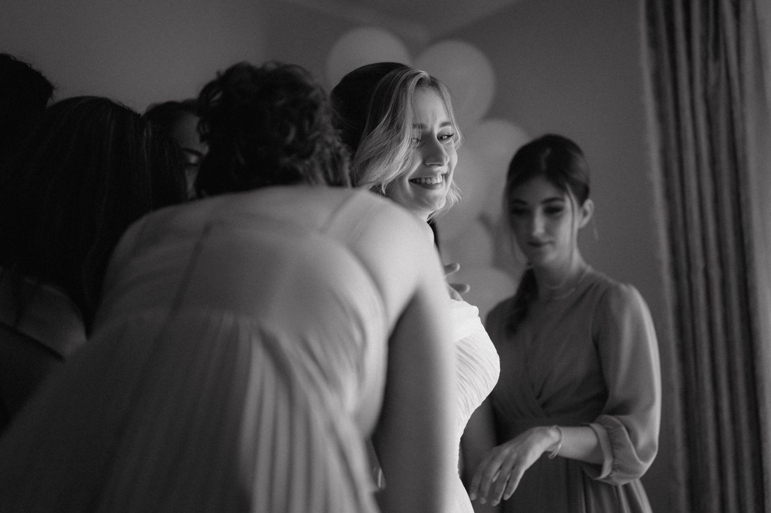 Candid wedding photography series captures intimate moments of couples dancing at a reception.