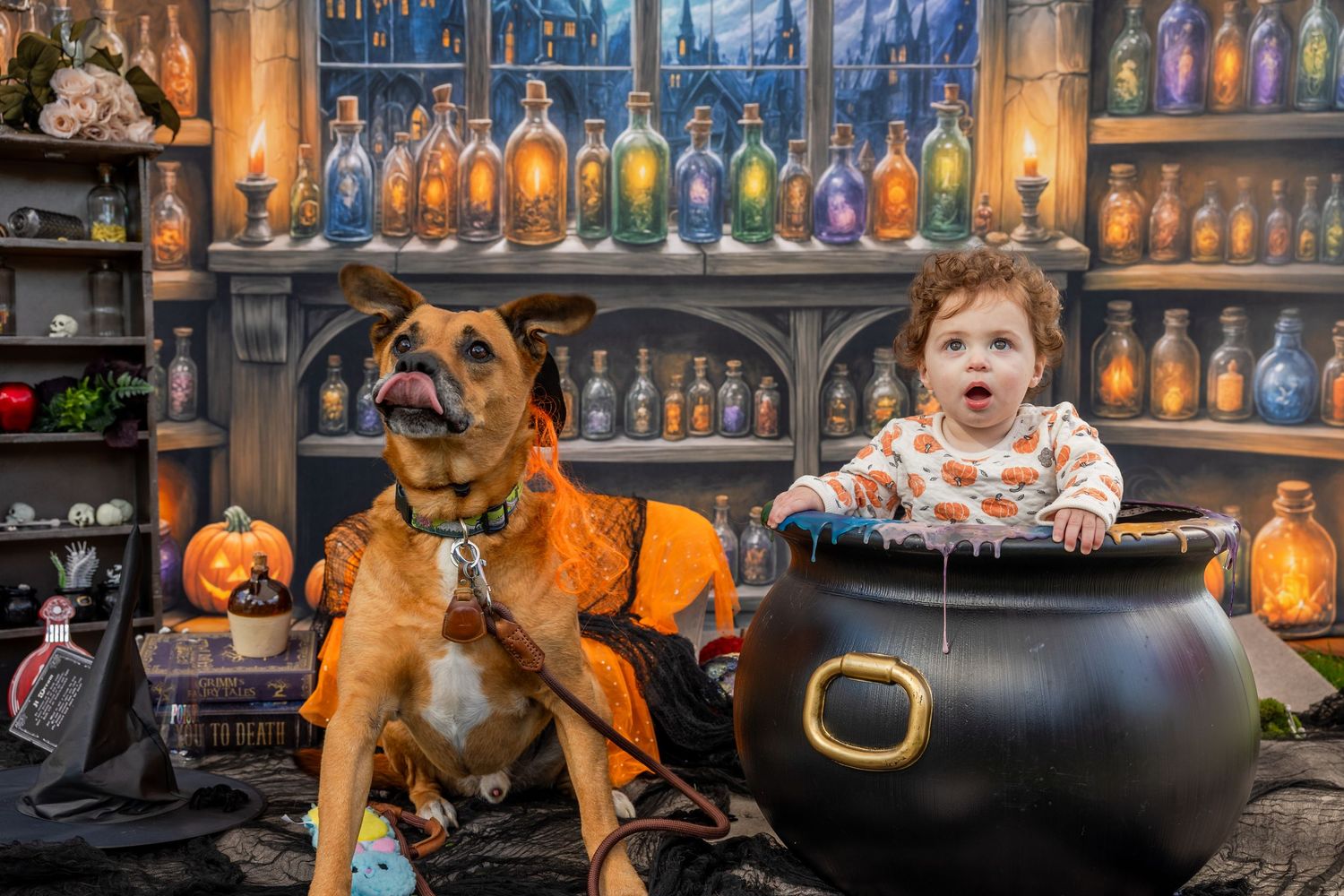 Small toy dinosaurs and characters create playful scene with bright pink T-Rex and orange objects on dark surface.