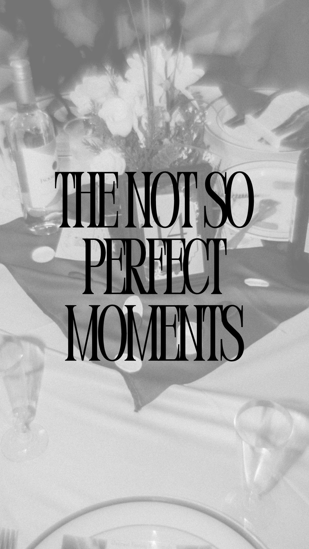 Black and white typography artwork showing 'The Not So Perfect Moments' text in elegant serif font against blurred background.