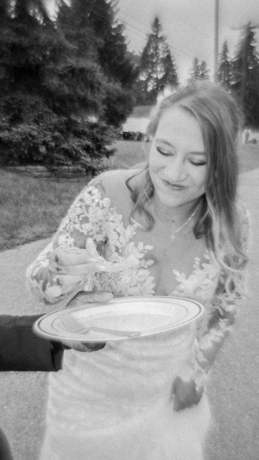 Black and white photo sequence shows someone eating a dessert outdoors with whipped cream getting on their nose.