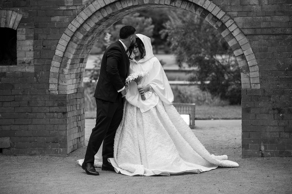 Bride touch her bridal and wedding dress on her wedding day in Sydney, wedding ring and wedding shoes