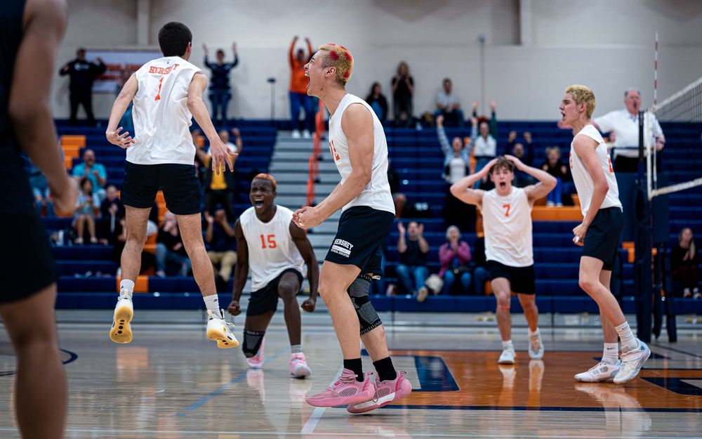 Hershey Trojans boys volleyball team erupts after 5-set win over Mechanicsburg Wildcats at Hershey High School— SportsFox Photography