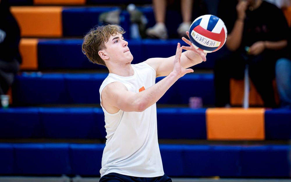 Hershey Trojans boys volleyball player serves vs Mechanicsburg Wildcats at Hershey High School, April 2026 — SportsFox Photography