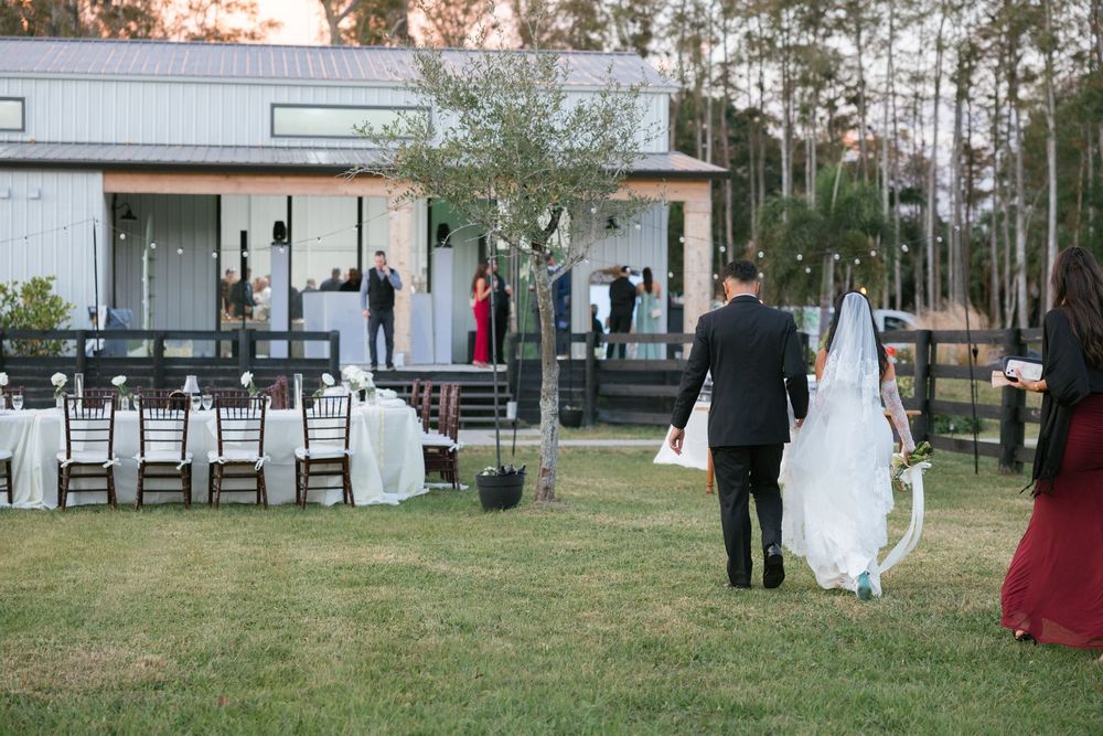 bride and groom walking away after just getting married editorial style shot documentary