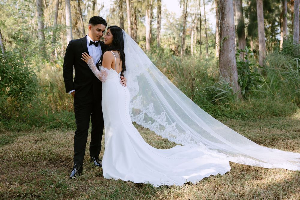 bride and groom portraits at barn wedding at the ranch 22 in lake worth in pine trees