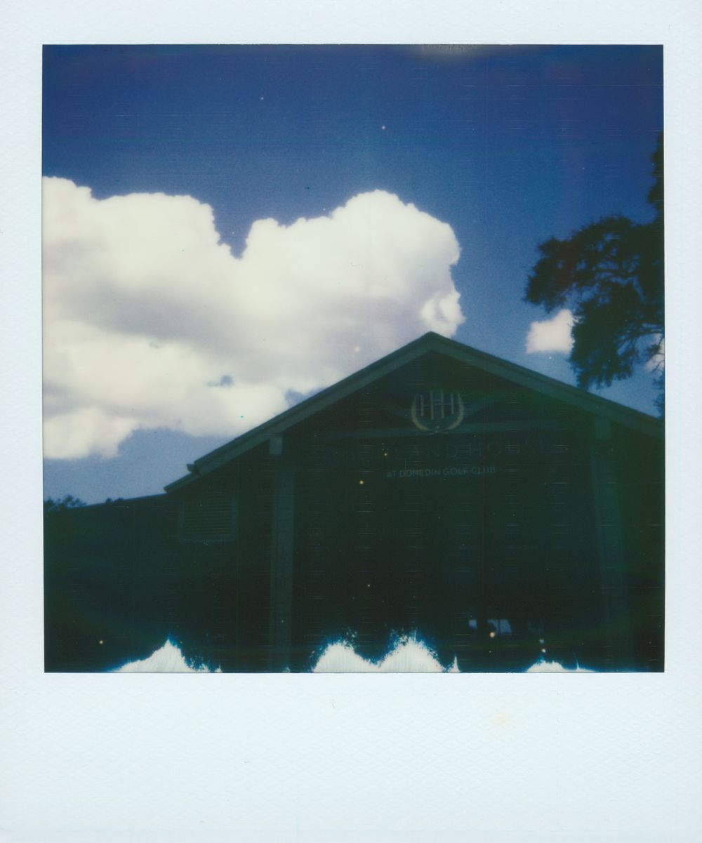 who shoots wedding photography with film & Polaroids in Tampa, Clearwater, St Pete, Naples, Miami, West Palm, and Orlando, Florida