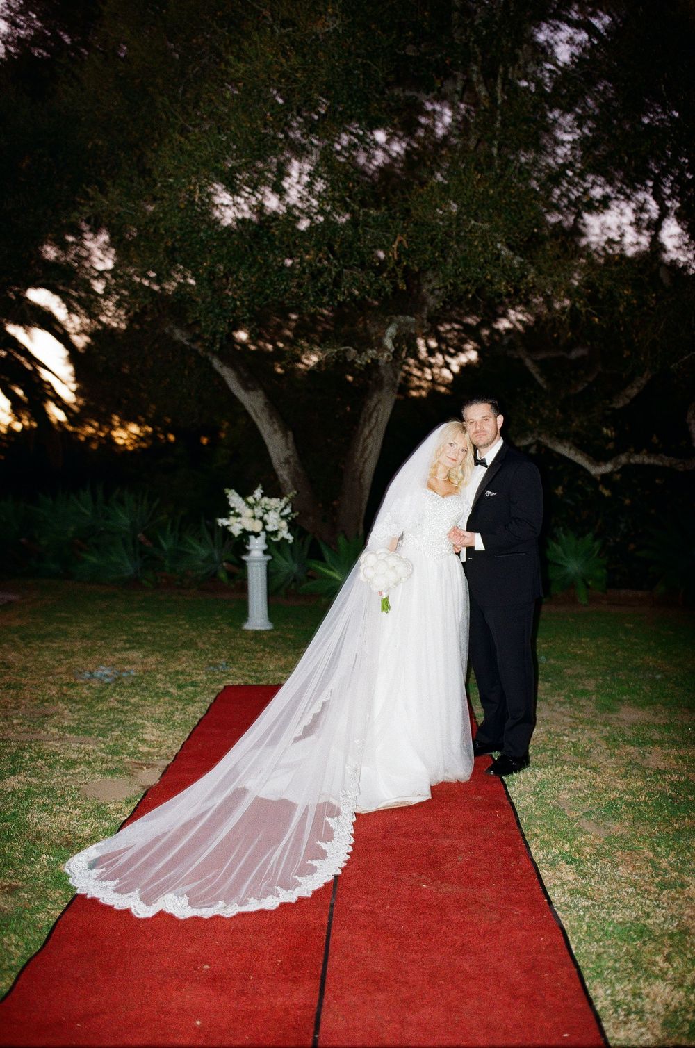 Vintage-inspired 35mm film wedding photography highlighting the unique, non-traditional details of a private property wedding.