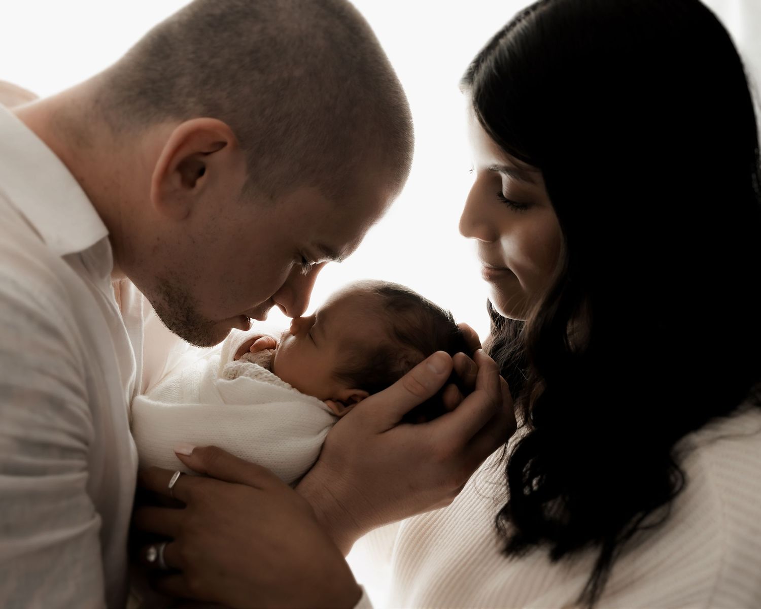 New family of three photographed in Nelson studio