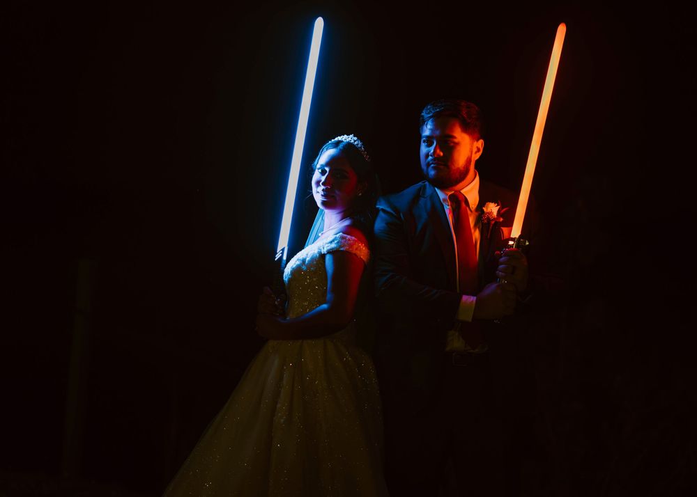 Disney-inspired wedding photography in Central Florida. Star Wars lightsabers captured by LexTakePix. Magical fairytale Orlando photography.