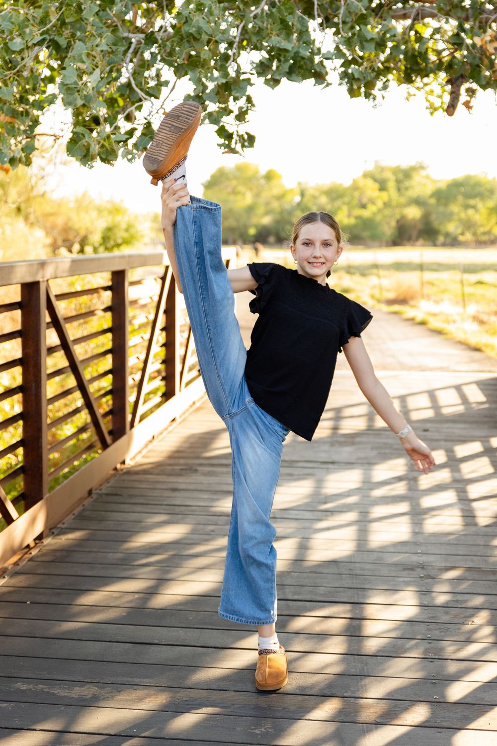 gymnastics on a bridge at Kirkland fields with southern utah photographer