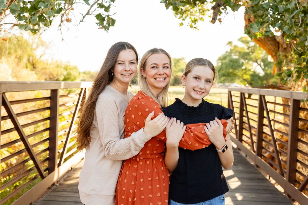 mom and 2 daughters enjoy each other's company at Kirkland fields in St. George Utah