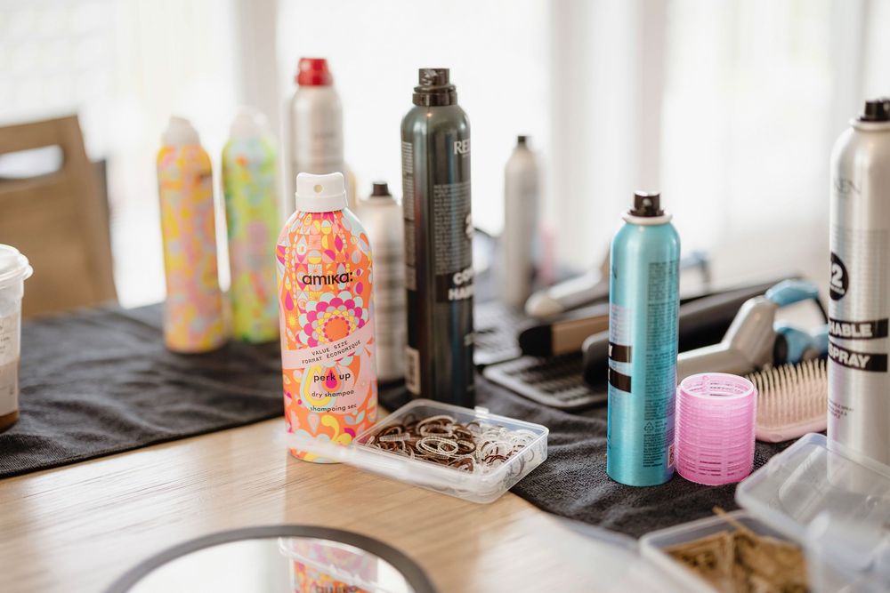 Hair spray and clips before the wedding
