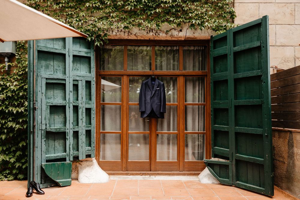 Sequence of five images showing green window shutters opening progressively against a stone wall with wooden window frames.