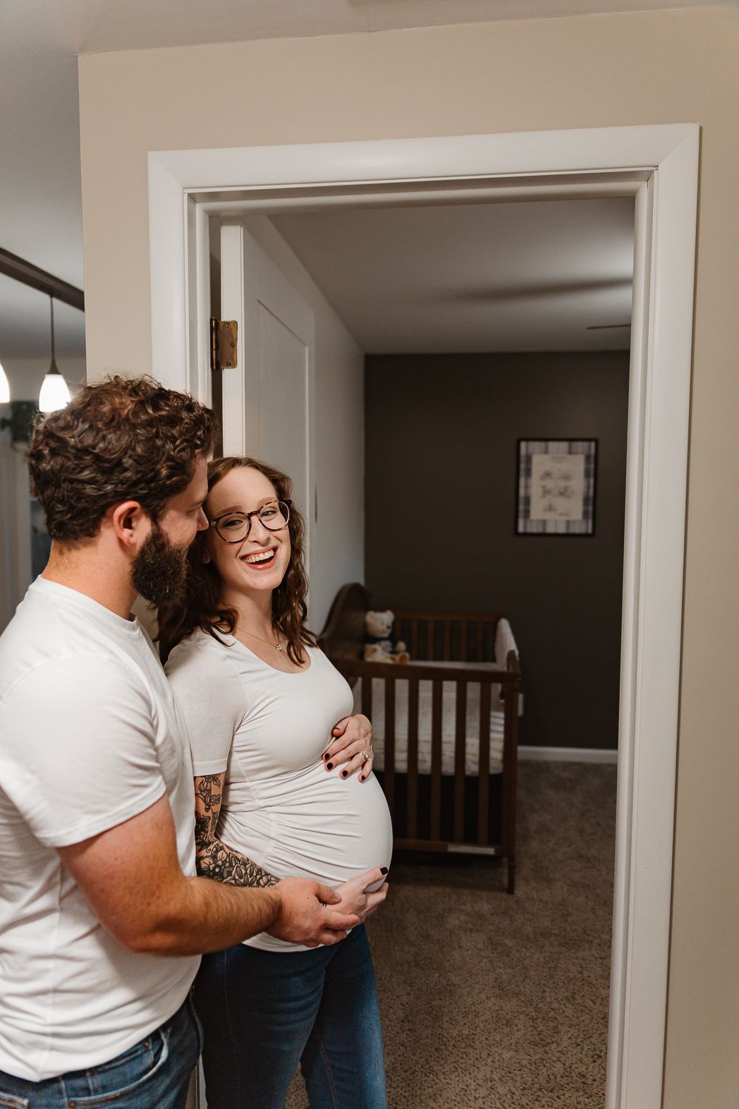 Series of candid shots showing a couple laughing and embracing in a casual home setting.