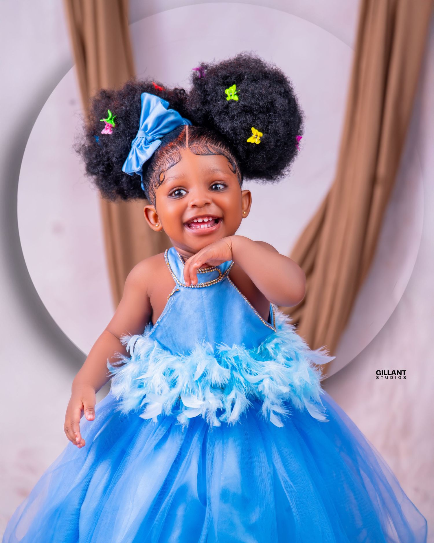 Adorable tulle dress with butterfly accessories in blue and white colors.