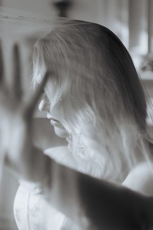 Soft focus profile portraits in black and white creating a dreamy, ethereal effect.
