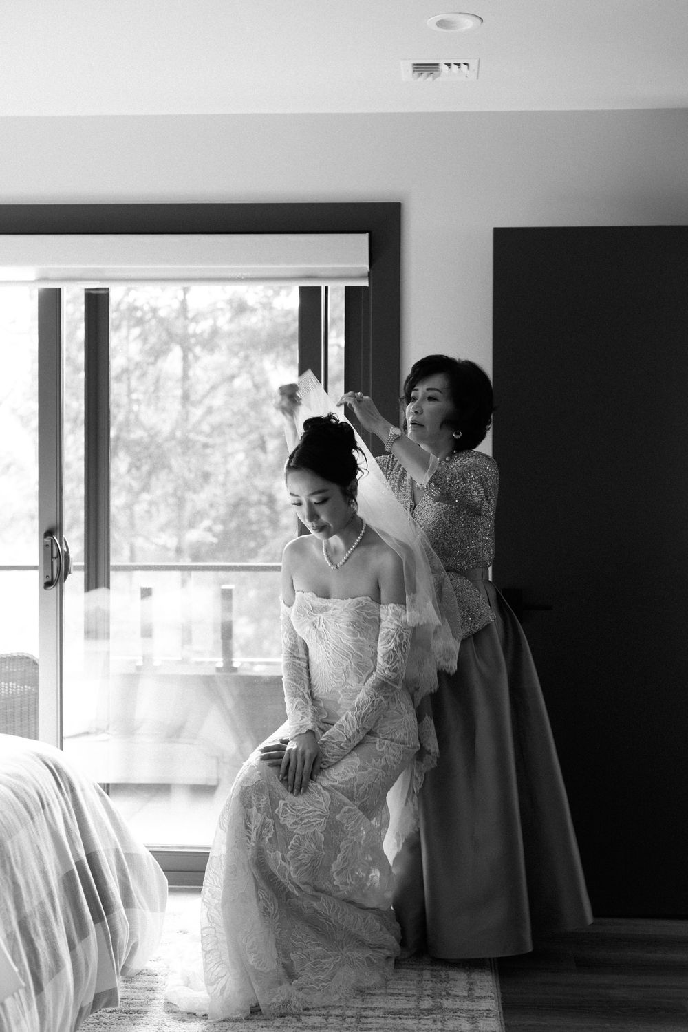 Wedding preparation scene with sunlit windows and flowing white dress details.
