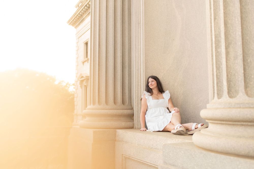 Unique Columbia, SC senior session at the state house during golden hour.