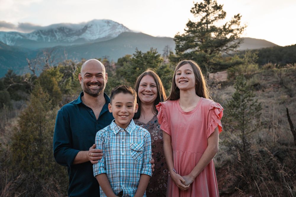 A scenic mountain landscape at sunset at Garden of the Gods in Colorado during a family photography session outdoors in nature