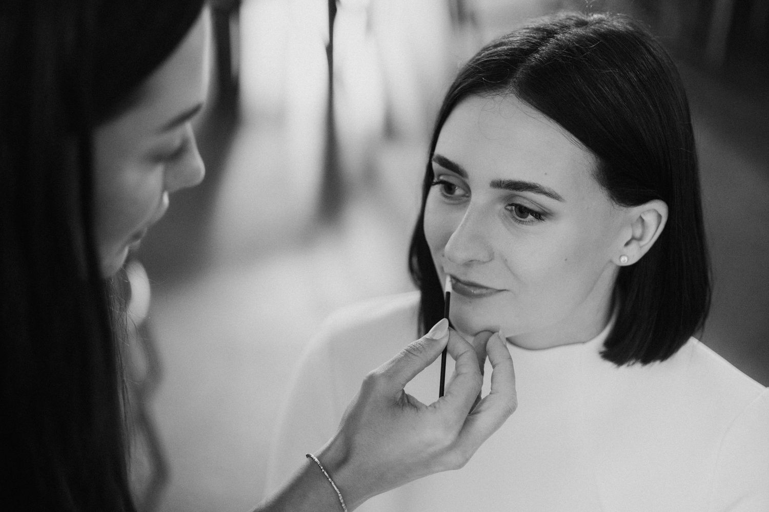Intimate black and white close-up portraits showing emotional moments.