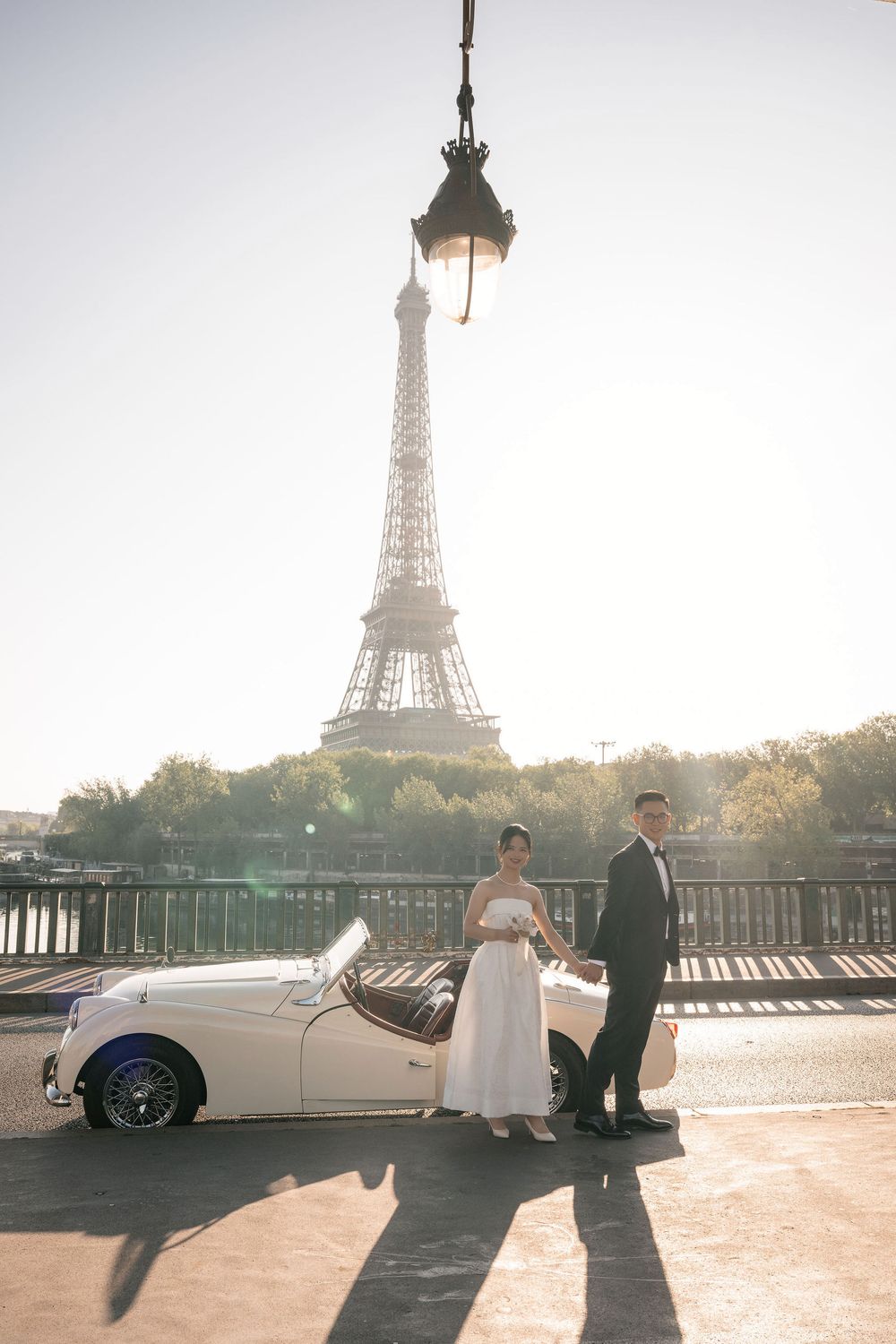 Romantic wedding photoshoot with the iconic Eiffel Tower in Paris during golden hour.