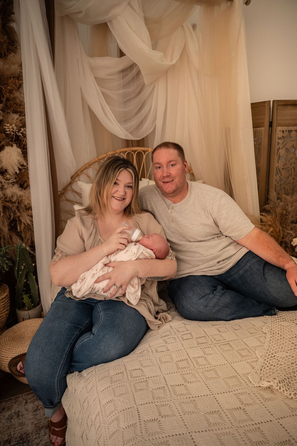 Lifestyle newborn photo session in Dallas-Fort Worth Texas in downtown Roanoke, TX photography studio with a boho setting