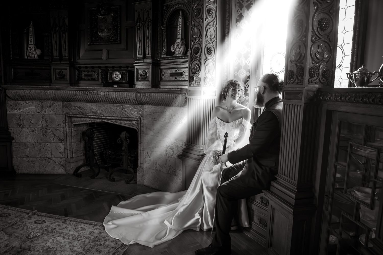 A black and white collage of wedding photos showing romantic moments in a vintage church setting.