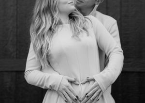 Intimate black and white portrait session showing affectionate couple poses.