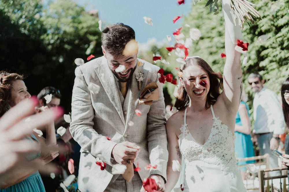 wedding guests celebrating outdoor ceremony casa dos arcos