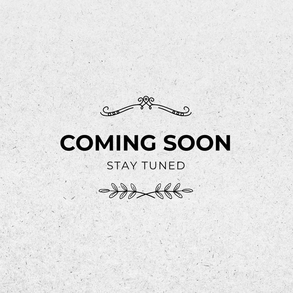 Elegant 'Coming Soon' and 'Stay Tuned' text with decorative flourishes on a light textured background.