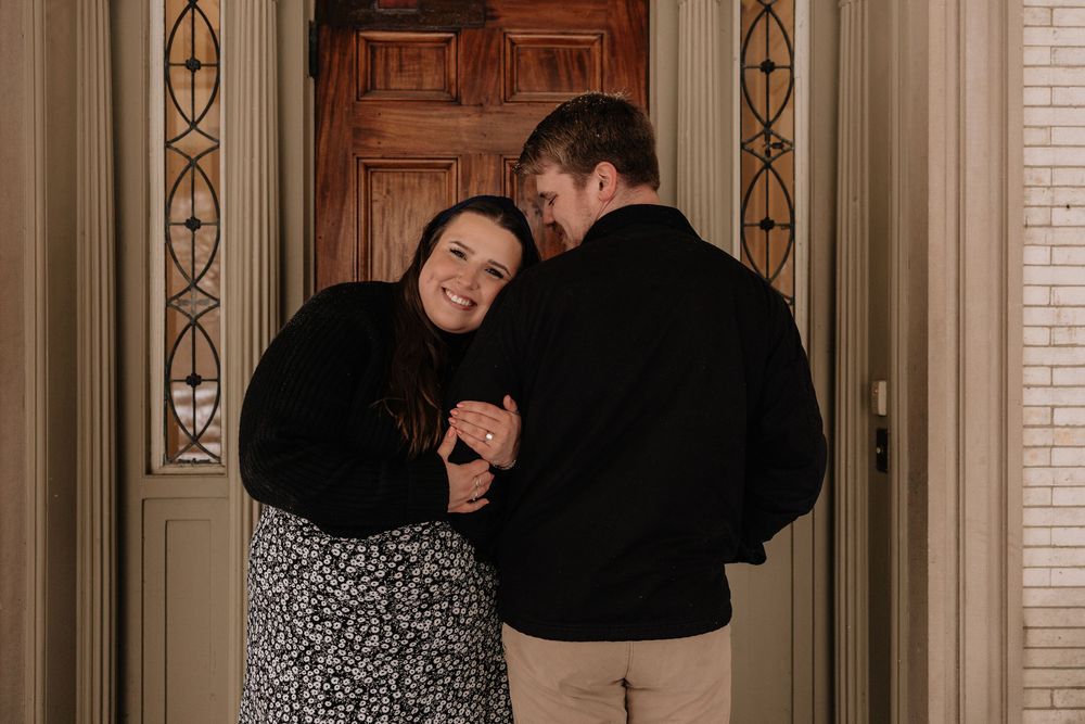 Candid engagement photos in Rochester NY showing natural connection and movement