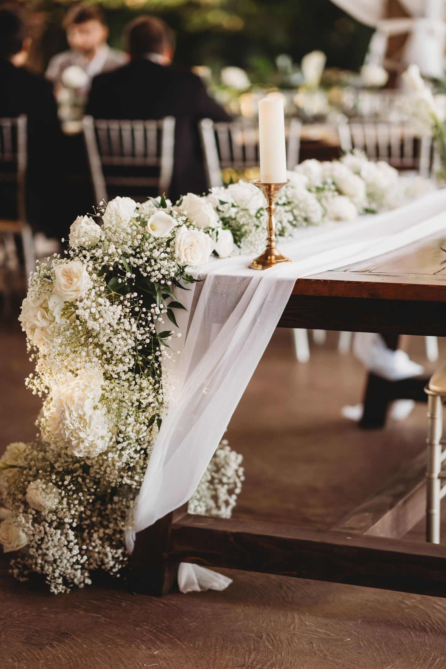 Elegant wedding details photographed during a romantic boat moment at Knotted Roots on the Lake