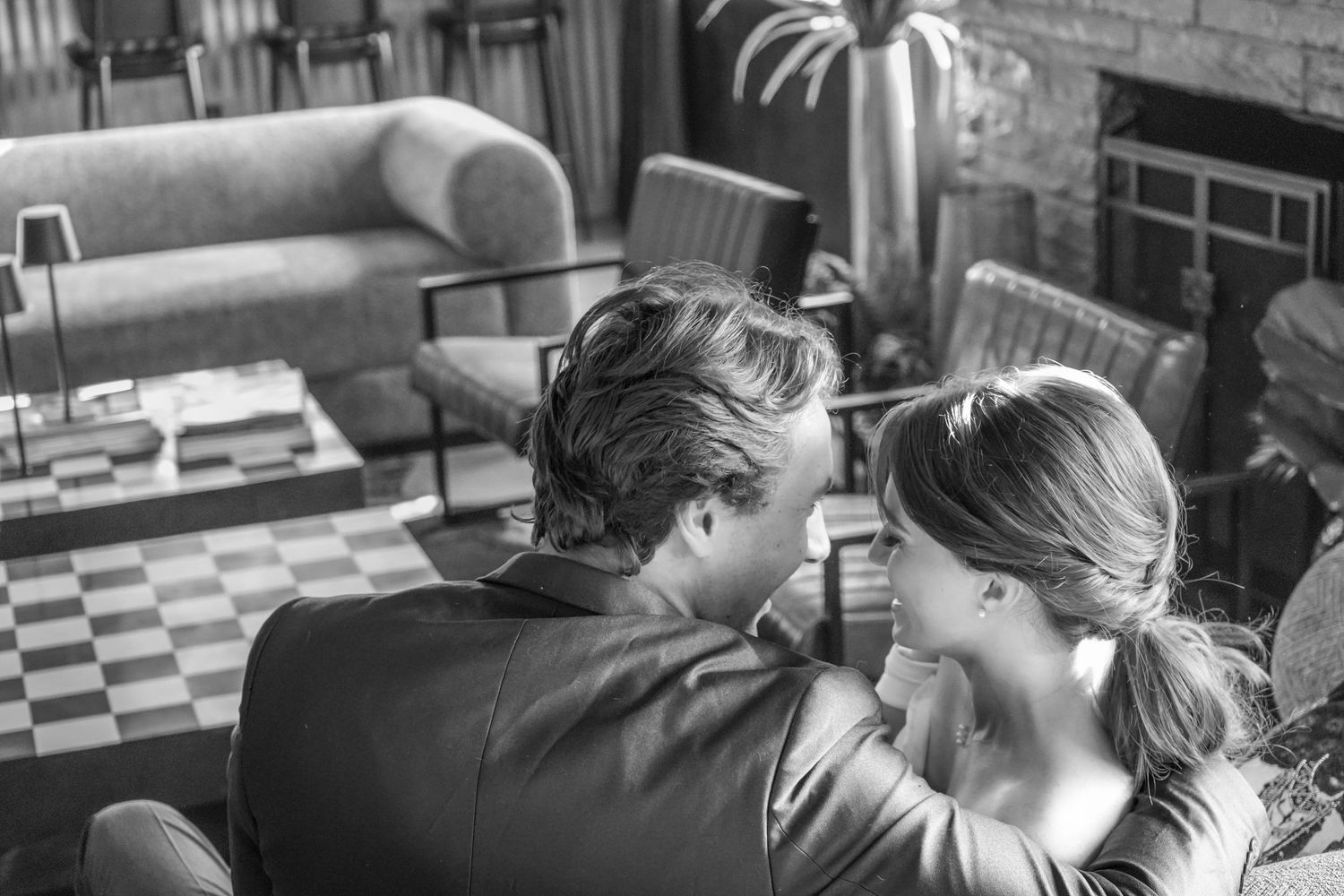 Black and white film stills show a romantic couple in intimate moments from a classic movie scene.