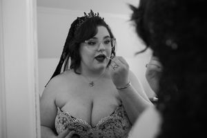 A black and white photo collage showing intimate moments of a bride getting ready for her wedding day.