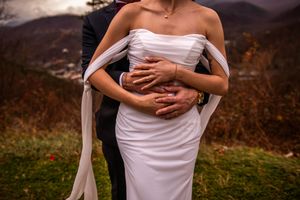 A romantic embrace between a couple in formal attire captured in a series of intimate wedding photos at sunset.
