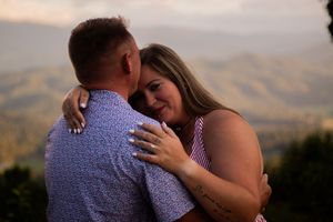 Romantic engagement photo series showing couple embracing in golden mountain sunset light.