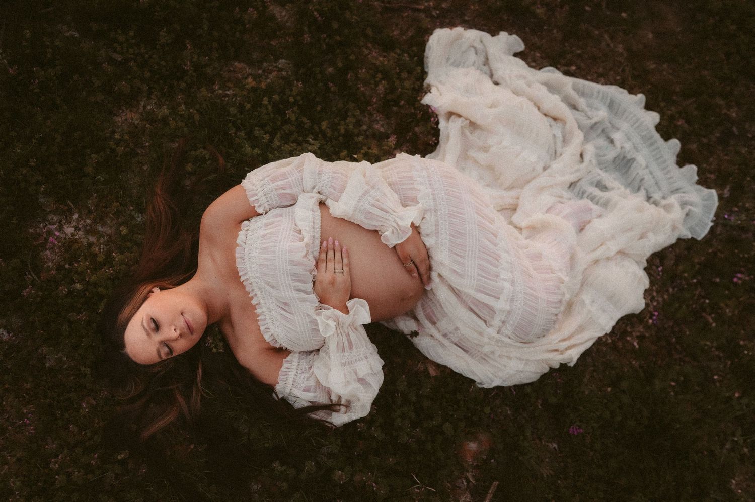 Indiana Motherhood and Newborn Photographer // Artistic newborn photo collection featuring baby in vintage white dress on dark surface.