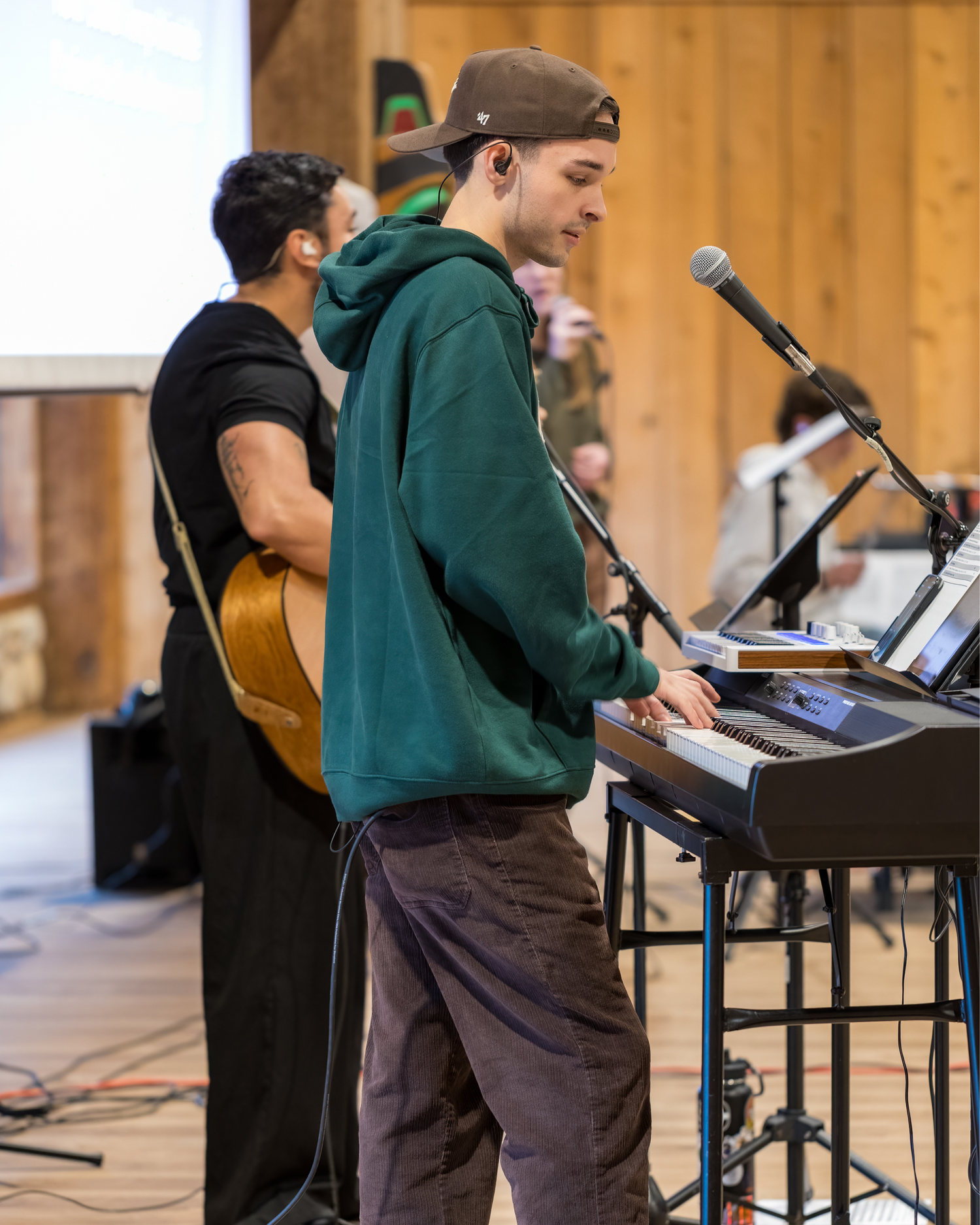 Valley Church Spotify Worship Playlist. Worship Leader playing the keyboard at church.