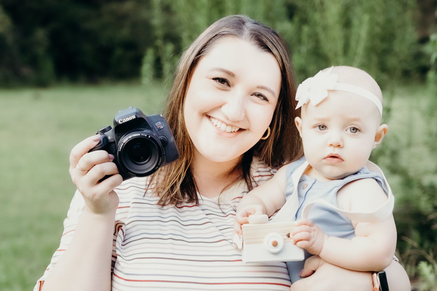 Mother and child portrait series in outdoor natural setting with soft lighting.