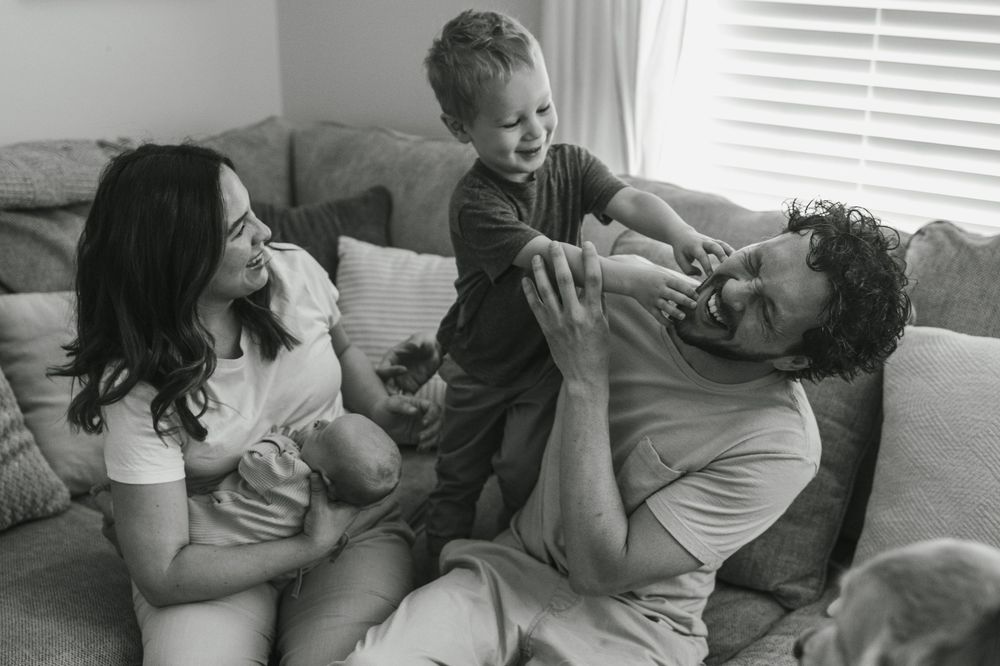 A heartwarming sequence of candid family moments shows playful interactions between loved ones on a couch at home.