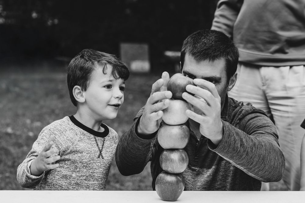A sequence of images showing hands holding and examining objects in natural light.