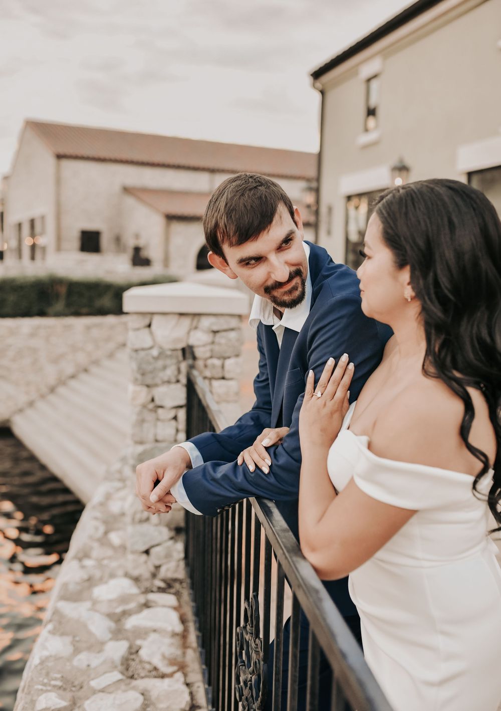 a bride and groom to be pose for engagement photos in north dallas
