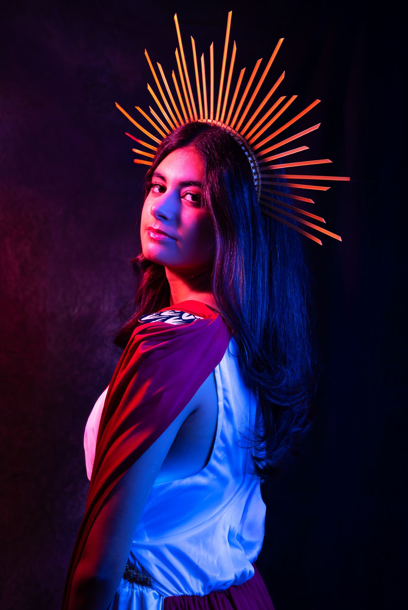 Eos, Goddess of the Dawn, girl with a sun crown with blue and pink LED lights - angle 2