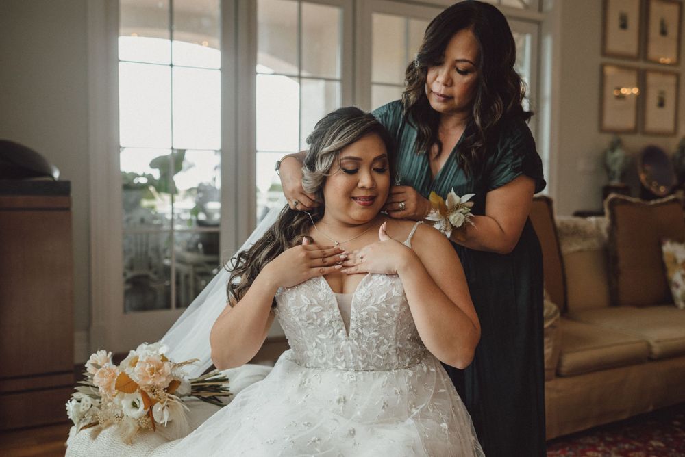 Wedding day preparation scene in a sunlit room with elegant decor.