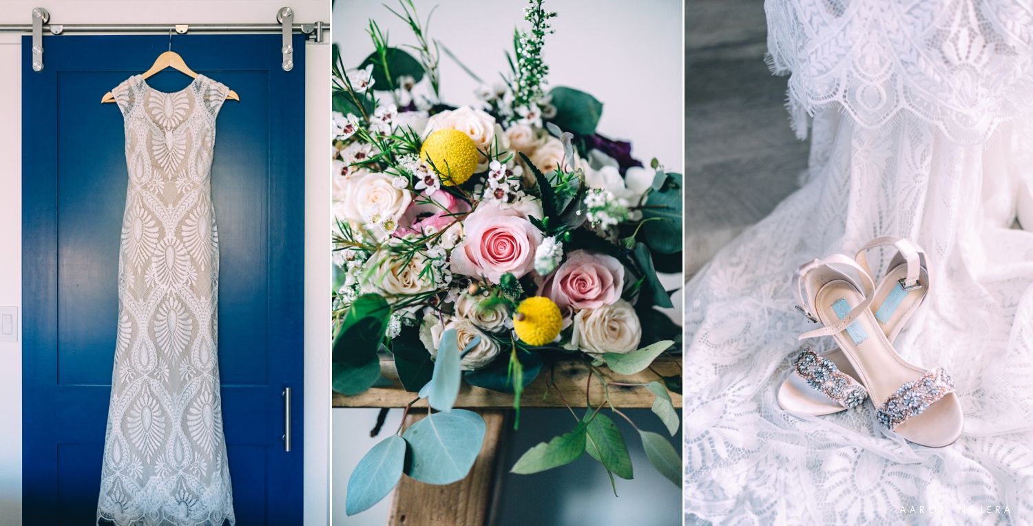 Wedding detail flatlay featuring a lace dress, floral arrangement, and silver shoes.