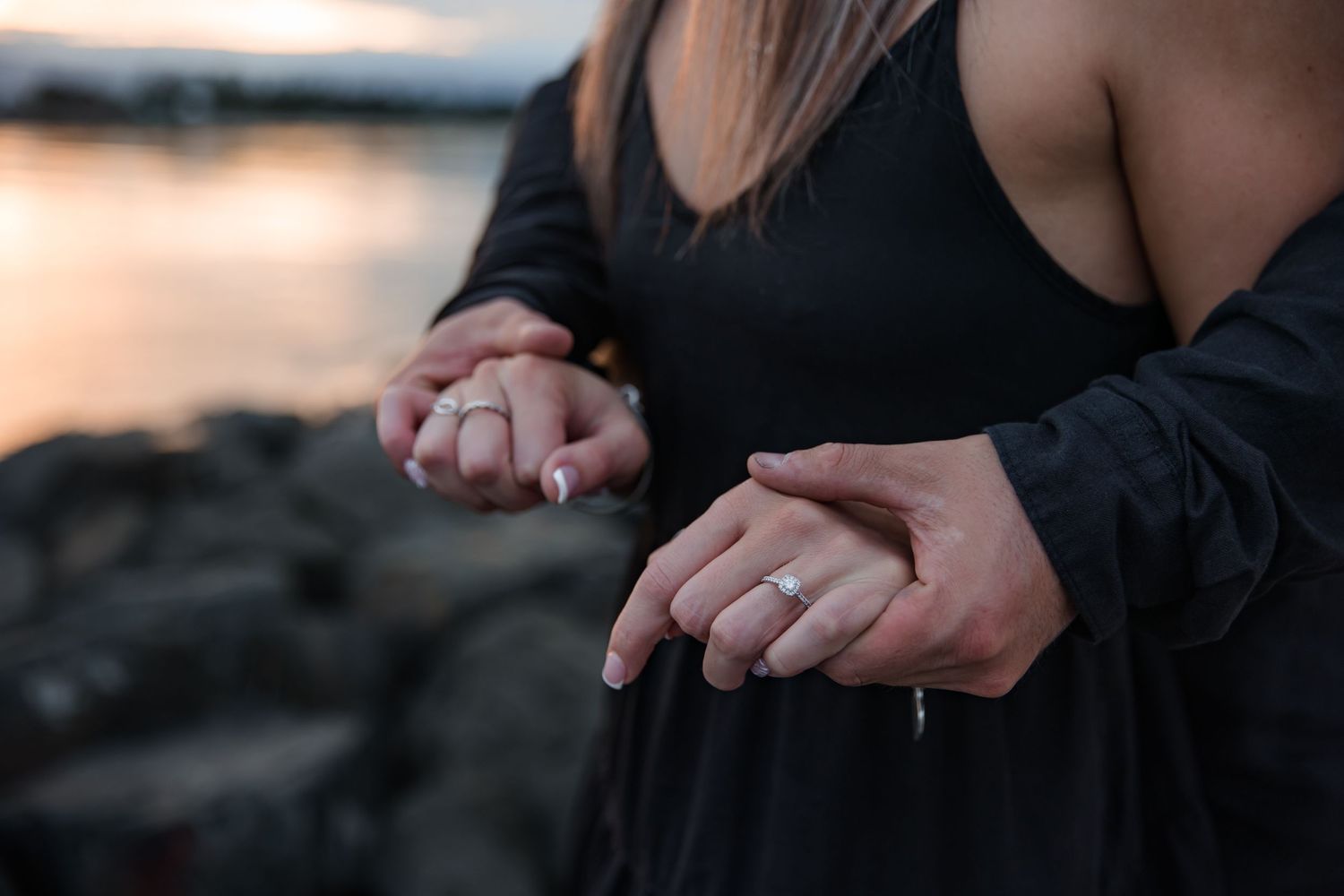 Sunset ring detail shot of couple in sunset at Windang beach, Illawarra